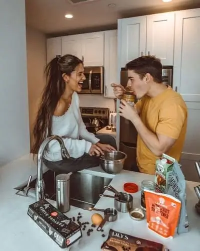 Bake Halloween cookies together for best halloween date night ideas for couples