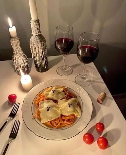 Best Halloween date night ideas for couples who would rather stay in than go out on Halloween night. Cook a yummy dinner together instead