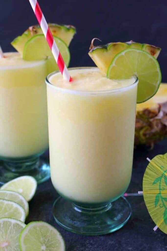 Pineapple coconut daiquiri garnished with pineapple and slice of lime