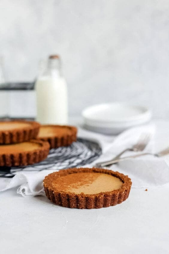 Pumpkin chai cheesecake tarts