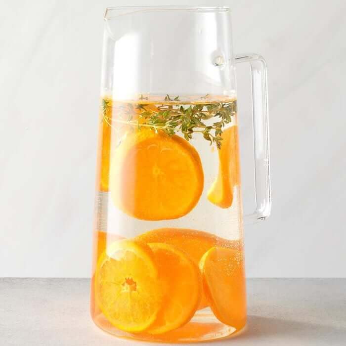 Tangering Thyme water displayed in a glass pitcher