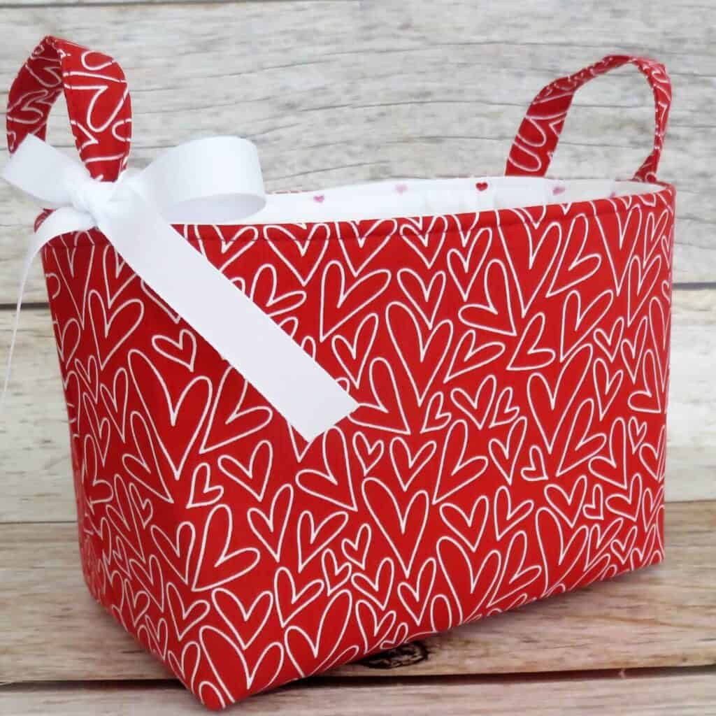 red and white cloth gift basket for homemade gift baskets