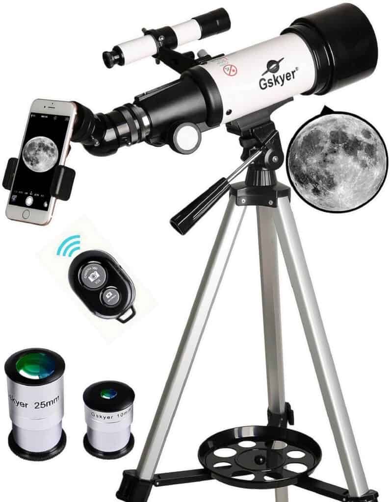 Telescope with 400mm (f/5.7) focal length and 70mm aperture, featuring fully coated glass lens for stunning images and eye protection. Perfect for budding astronomers, this telescope includes two replaceable eyepieces and a 3x Barlow lens for enhanced magnification. Comes with a wireless remote, smartphone adapter, and adjustable aluminum tripod for versatile viewing positions and easy transportation