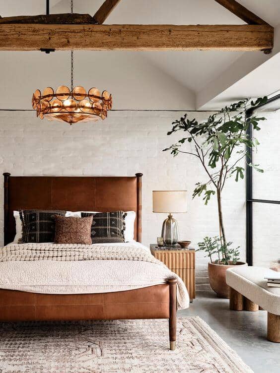 A bedroom featuring chestnut, cream, and green color palette.