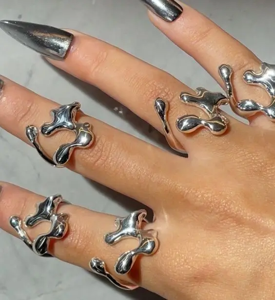 Liquid silver rings as seen on Kourtney Kardashian