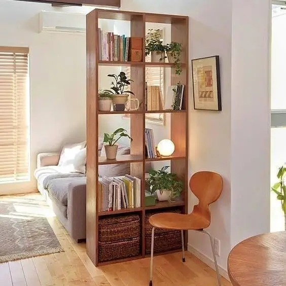 Shelves as room dividers in long narrow living room dining room combo