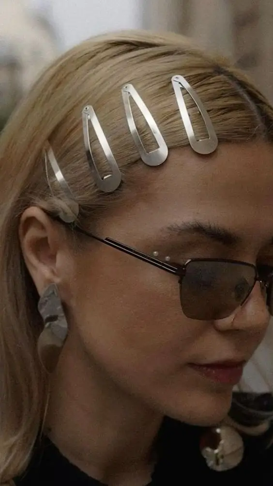 Y2K hairstyle with silver barettes