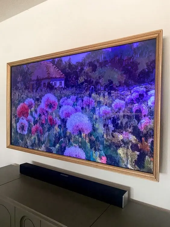 Smart tv in modest gold frame
