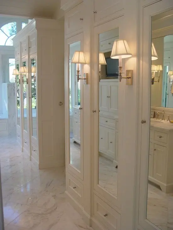 Sconces in the closet give an upscale look, and many are rechargeable or battery-operated.