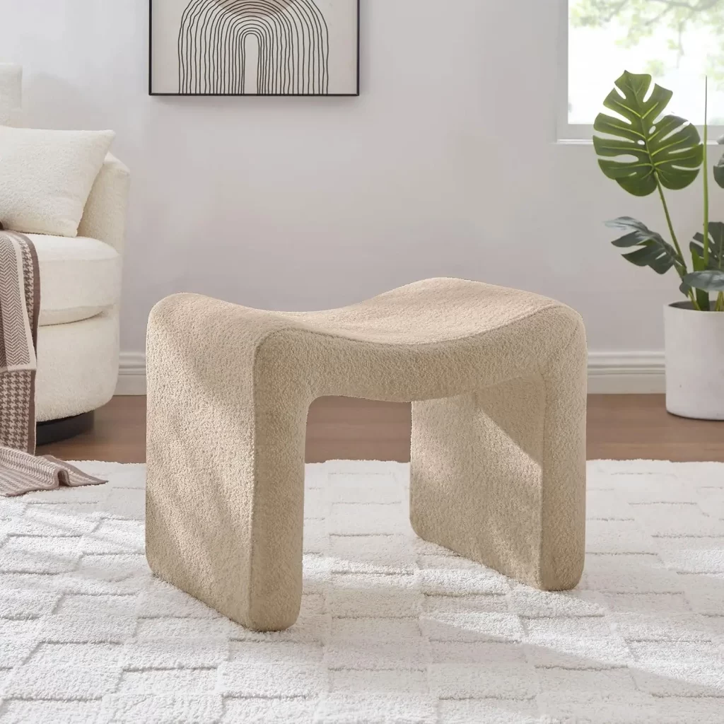 Fuzzy ottoman for woman's bedroom
