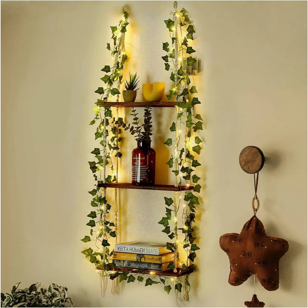 shelf with fairy lights and vines for dorm room