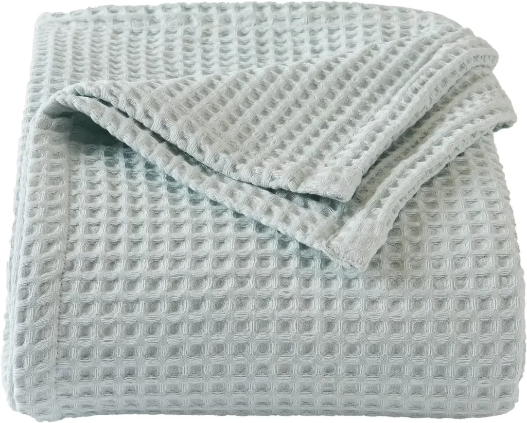 Icy blue waffle throw blanket for coastal retreat bedroom