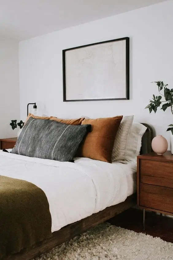 Stylish leather accent chair in a contemporary masculine bedroom, adding comfort and sophistication.