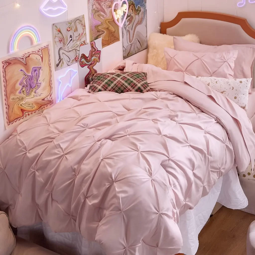 Pink pin tuck bedding for dorm room