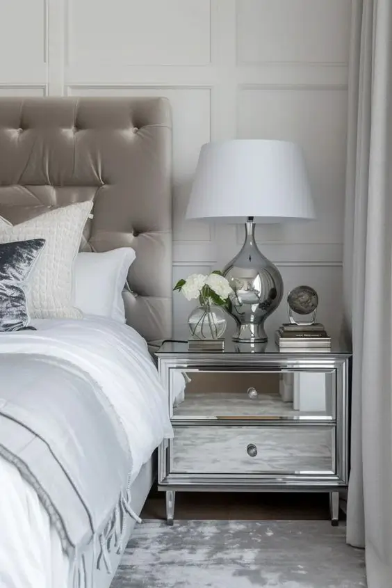 Silver accents in womens bedroom catch the light and look beautiful