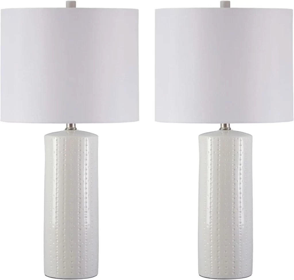 Textured cream ceramic table lamps for coastal retreat bedroom