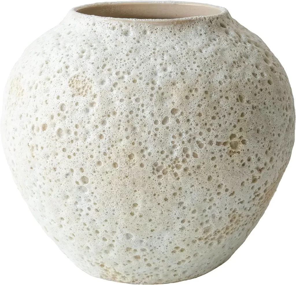 Natural white ceramic vase perfect for decorating woman's bedroom