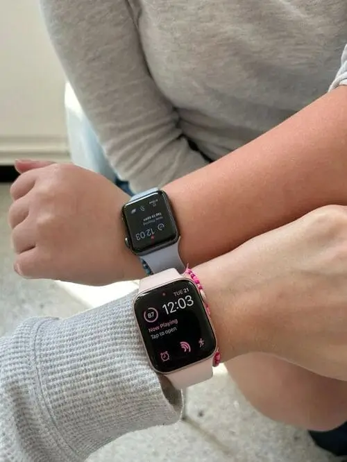 
Apple Watch on a student's wrist, displaying notifications and time, ideal for managing college schedules and staying connected.