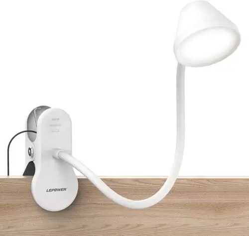 Clip on book light lets you read and study in bed