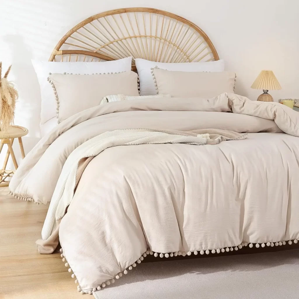 Neutral pom pom comforter for dorm room