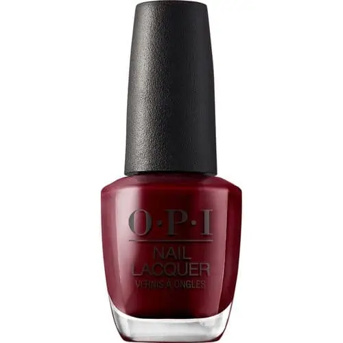 Close-up of hands with OPI Got the Blues for Red nail polish, showcasing deep wine-red nails with a glossy finish, perfect for fall and winter manicures.