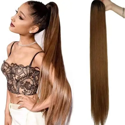 Ariana Grande clip-in ponytail featuring long, sleek hair extensions for creating her signature high ponytail look, perfect for completing an Ariana-inspired costume or adding a touch of pop star glam to any outfit.