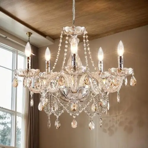 Elegant champagne crystal 5-light chandelier in a farmhouse living room, combining luxurious crystal details with a warm, rustic finish. This statement lighting piece adds a touch of glamour and sophistication, elevating the overall farmhouse aesthetic.