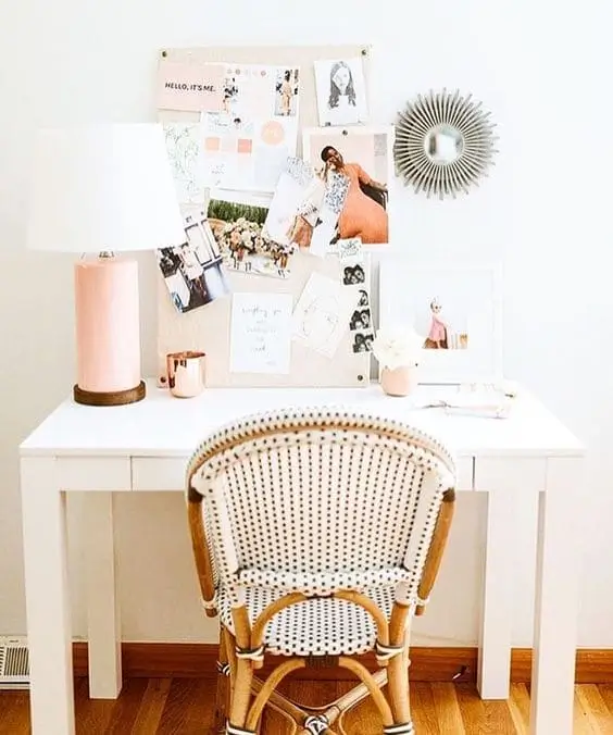 A cute cork board or white board gives her extra space to organize and display photos