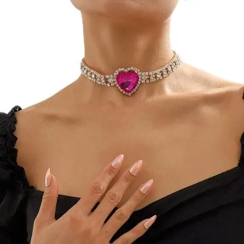 Rhinestone heart choker featuring sparkling crystals and a delicate design, perfect for adding a touch of glamour to any pink Halloween costume or festive outfit.