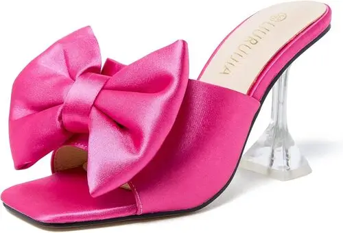 Pink satin bow toe shoes featuring a delicate satin bow on the toe and a stylish see-through heel, perfect for adding a touch of elegance and charm to any Halloween costume or special occasion outfit.