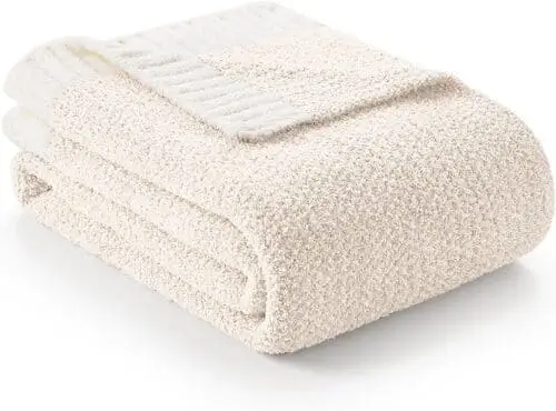 Warm fuzzy throw blanket from Amazon, perfect for enhancing the cozy ambiance of your farmhouse living room. This soft, plush blanket adds comfort and a touch of luxury, seamlessly blending with rustic or modern farmhouse decor styles.