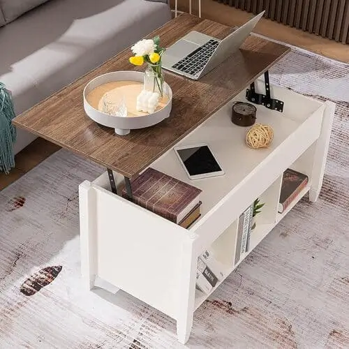 Convertible coffee table in a stylish living room bedroom combo, perfect for compact spaces. This multifunctional piece transforms into a desk or dining surface, offering both functionality and modern design in small apartment setups