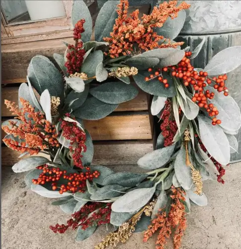 Fall berry wreath with rich red and deep purple berries, accented by autumn leaves and greenery. Perfect for adding vibrant seasonal color to your home or front door.