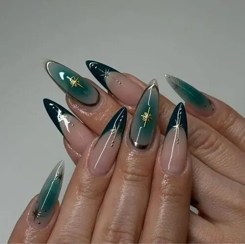 Elegant green opaque nails with delicate gold stars, perfect for a chic and festive Christmas 2024 manicure. Ideal for holiday nail inspiration and trendy designs.