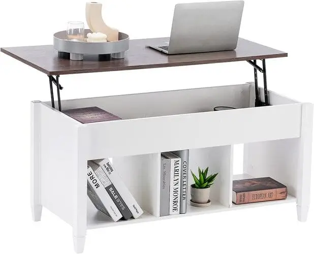 Convertible coffee table in a stylish living room bedroom combo, perfect for compact spaces. This multifunctional piece transforms into a desk or dining surface, offering both functionality and modern design in small apartment setups