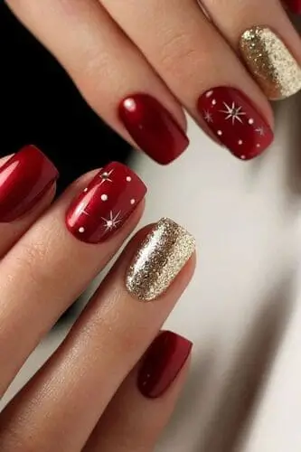 Classic red Christmas nails with gold accents for a festive and elegant holiday manicure, perfect for 2024 seasonal nail trends.