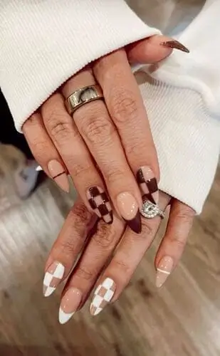 Trendy brown and white checkered nails—stylish nail design idea for a bold, modern manicure look