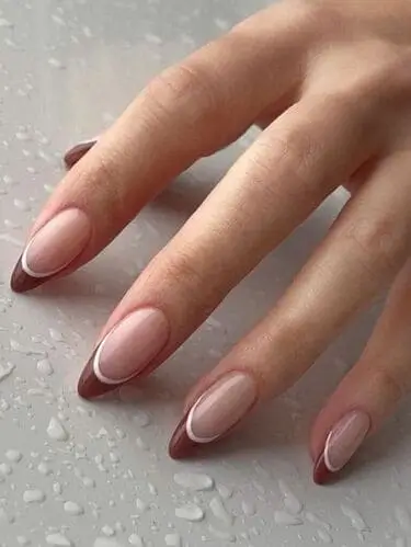 Elegant brown and white French tip nails for a chic, modern manicure look—perfect inspiration for your next nail design.