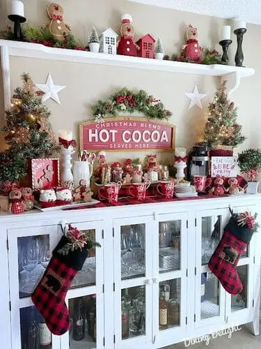 Holiday-themed hot cocoa bar with festive mugs, toppings, candy canes, and seasonal decor – perfect for Christmas parties and cozy winter celebrations