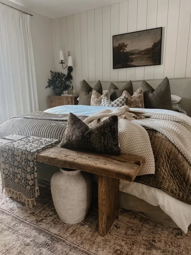 Earthy rustic deep neutral bedroom with layered textures, wood accents, and calming tones, creating a cozy, grounded aesthetic perfect for relaxation and modern home decor.