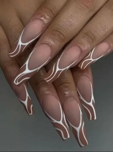 Stylish brown French tip nails with white line accents—modern nail design inspiration for a chic and unique manicure look.