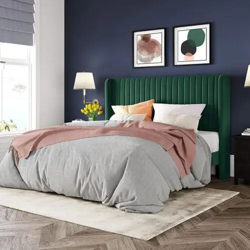 Luxurious green velvet headboard for an eclectic bedroom, available on Amazon, ideal for creating a stunning and unique focal point