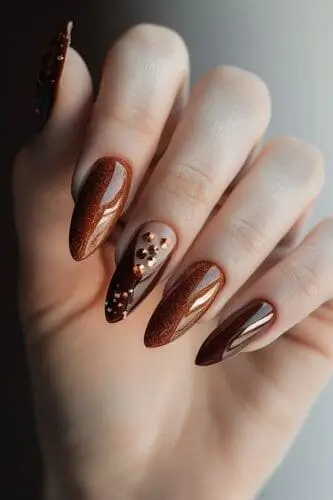 Delicious melted chocolate manicure with sprinkle accent nail—playful and trendy nail art inspiration for a sweet, unique look.