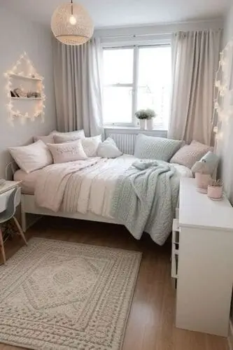 Cozy small bedroom with pastel throw pillows, perfect for creating a warm and inviting vibe. Ideal for small space decor inspiration with soft, calming tones.