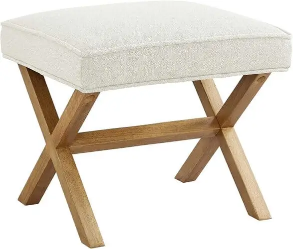 Modern coastal footstool for a coastal bedroom, available on Amazon, featuring sleek design and natural materials for a stylish seaside vibe.