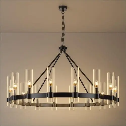 48-inch black wagon wheel chandelier with glass shades and 16 lights, perfect for creating a bold, modern statement in any bedroom. Available on Amazon.