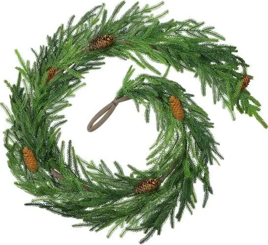 6-foot Norfolk pine garland draped around the front door; natural Christmas greenery for a welcoming, elegant entrance.