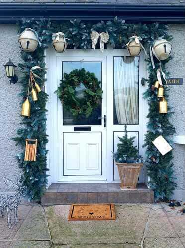 DIY large christmas bell garland for your front door you can easily recreate at home using mixing bowls