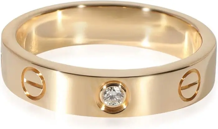 Timeless Cartier ring in gold, sophisticated and expensive Christmas gift idea for special occasions