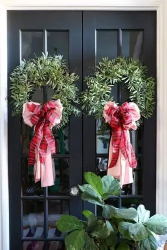 Olive Christmas wreaths with elegant bows for christmas door decoration ideas.